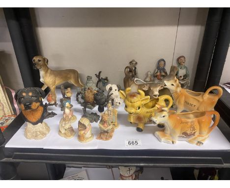 A mixed lot including Border Fine Arts Mrs Tiggywinkle, Foxy whiskers, Great Dane and rottweiler figures, vintage cow creamer