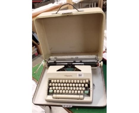 An Olympia cased typewriter