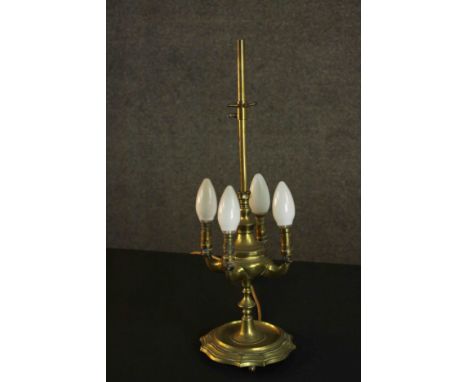 A 19th century brass four branch converted desk lamp on a ridged base. (one foot missing) H.50 Dia.17cm. 