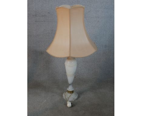 A contemporary white veined marble baluster table lamp, raised on circular foot. H.96 W.50 D.50cm 