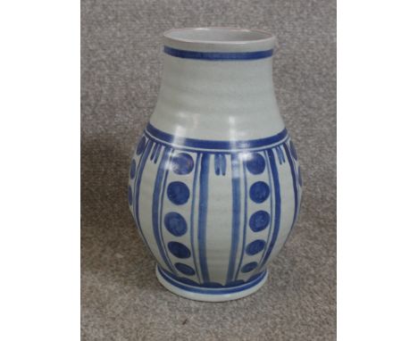 A mid 20th century blue and white Poole pottery vase, decorated with circles and abstract pattern, painted and impressed mark