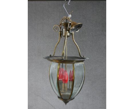 A 19th/early 20th century gilt brass and glass three branch hall lantern. H.52 W.27 D.27cm 