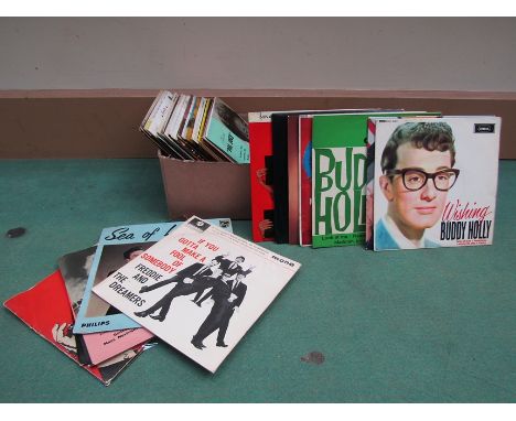 A collection of 1950's and 1960's picture sleeve 7" EP's including Buddy Holly, Marty Wilde, Julie Rogers, The Tornados, Ella