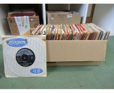 A collection of assorted 1960's 7" singles including The Beatles, The Rolling Stones, Roy Orbison, Elvis Presley, Dusty Sprin