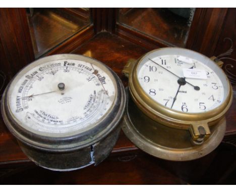 A Sestrel brass bulkhead clock, together with similar ship's barometer  