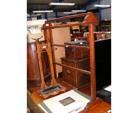 A mahogany towel rail, together with oak umbrella and stick stand 