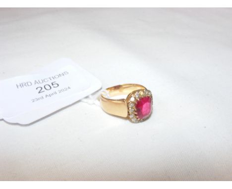 An unmarked yellow metal ring set with ruby and diamonds (missing stones)  CONDITION REPORT not a natural ruby5.2gsize approx