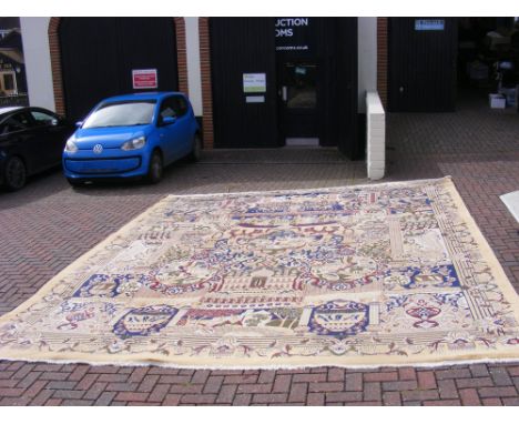 A light ground naturalist pattern Indian carpet - approx. 5 metres x 4metres