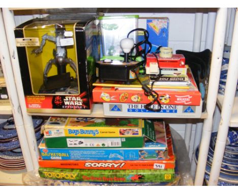 A Star Wars Episode 1 Animated Destroyer Droid Room Alarm in box, together with assorted vintage games - on two shelves 