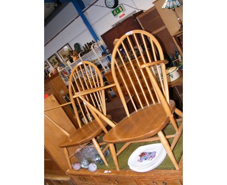 A pair of vintage mid century Ercol 'Golden Dawn' tub chairs 