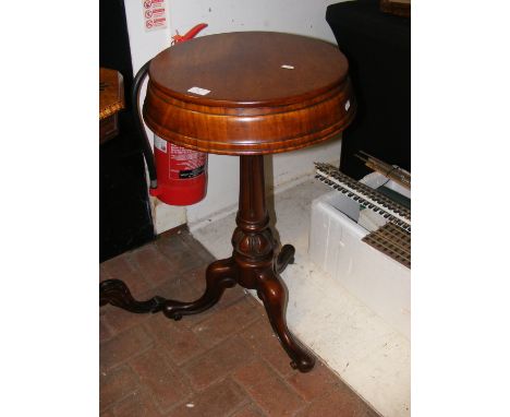 A Victorian mahogany circular teapoy on pedestal