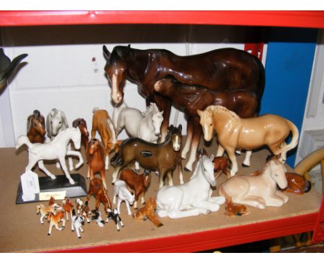 Assorted ceramic horse ornaments including Beswick