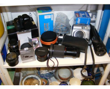 Vintage photographic equipment, including cameras and lenses 