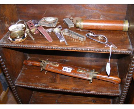 Wristwatches, pocket watches, a brass and wood cased telescope and a vintage Indian carving set - on two shelves 