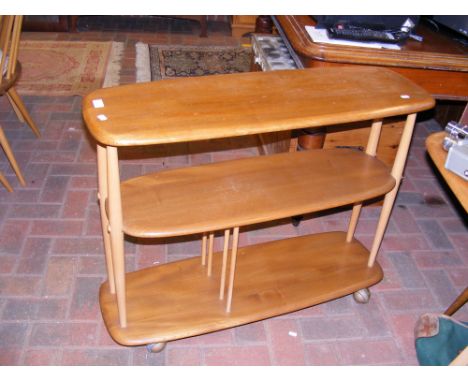 A vintage mid century Ercol three tier bookcase on castors - Model 361 