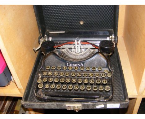 A vintage Corona typewriter in case 