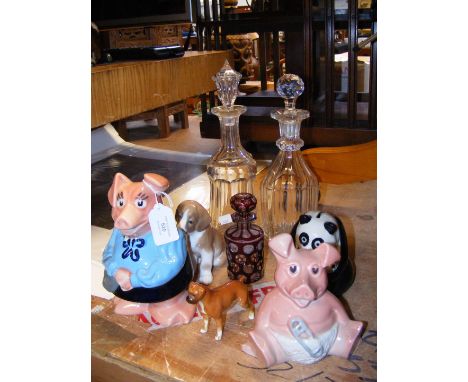 Two Wade NatWest Piggy Banks, together with collectable glass decanters, Beswick Boxer dog, Royal Copenhagen dog and Wade Pan