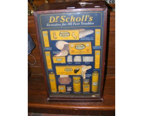 A vintage advertising cabinet for Dr Scholl's Remedies for All Foot Troubles  