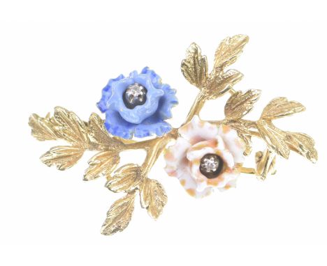 A diamond and enamel floral brooch The brilliant cut diamond stamen, with a gold, blue and pink enamel articulated petal surr