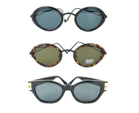 Versus by Gianni Versace: Three pairs of vintage sunglassesDiffering designs, the first with black frames and Versus gold ton