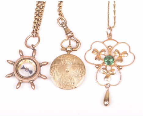 An early 20th century gold and paste necklaceIn openwork shamrock design, centring a circular shaped green paste, suspending 