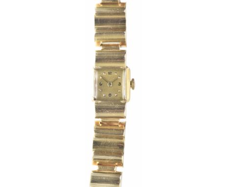 An American 1950's ladies gold bracelet watchThe square gold dial, with applied gold dot and Arabic numeral hour markers, gol