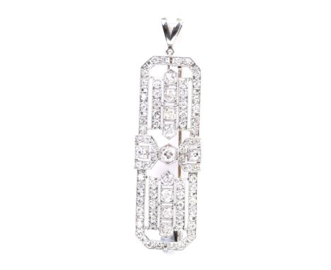 An exquisite French Art Deco diamond and platinum pendant/brooch, circa 1925Of rectangular panel form with canted corners, se