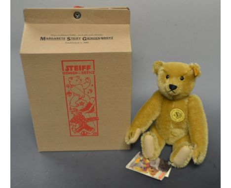 A Margaret Steiff Richard Steiff Teddy bear, 1905 reissue/gold plush, yellow tag, boxed