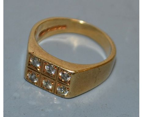 A six stone diamond ring, rectangular platform set with two rows of three round brilliant cut diamonds, 9ct gold shank, size 