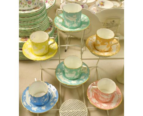 A set of six Royal Crown Derby Chinese Bird pattern harlequin coffee cans and saucers
