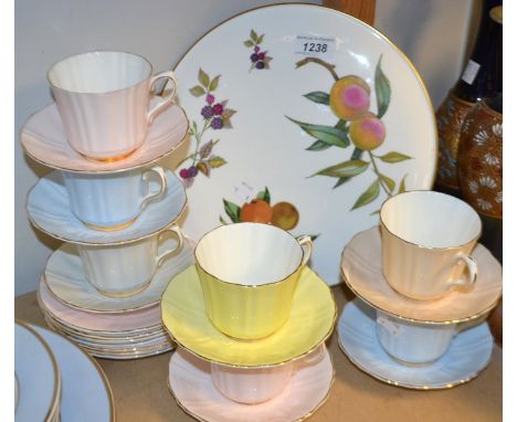 Pastel coloured cups and saucers and a Royal Worcester cake plate