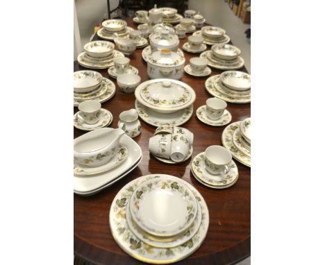A Royal Doulton Larchmont Dinner and tea service, comprising 18 dinner plates , a pair of service plates, 22 dessert plates ,
