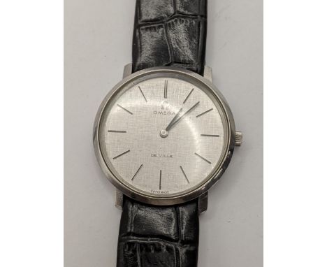 An Omega DeVille, manual wind, ladies, stainless steel wristwatch, circa 1969, having a silvered dial with baton markers, on 