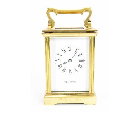 A Mappin &amp; Webb carriage clock, with brass and bevelled glass case, enclosing an enamel face with Roman numeral dial, wit