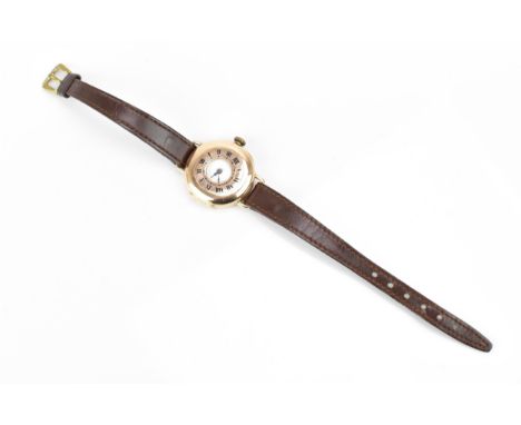 An early 20th century, ladies, 9ct gold half hunter wristwatch, having an empty white enamel dial, the outer case having Roma