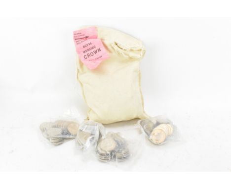 A UK original bank bag having Royal Wedding 200 Pieces ticket, containing eight sealed plastic bags of the 1981 commemorative
