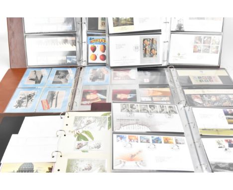 A collection of six Royal Mail albums of mixed first day covers to include Royal Mail Presentation Packs, Postcards, Universa