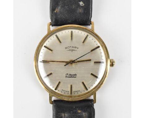 A Rotary, manual wind, gents, 9ct gold wristwatch, having a silvered dial with baton markers, centre seconds, later black lea