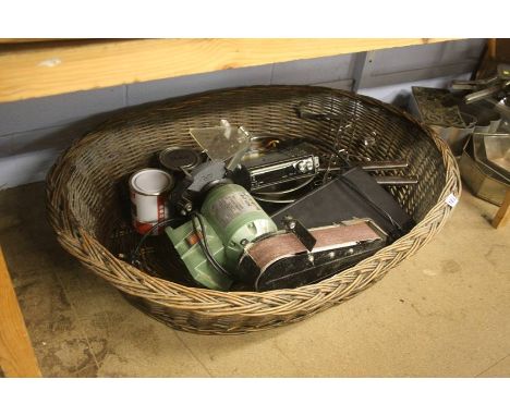A basket containing tools etc.