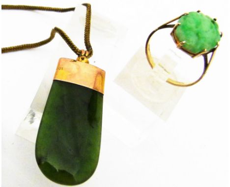 JADE RING AND PENDANT. 9ct yellow gold jade set ring A/F and a green jade pendant