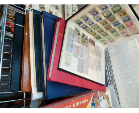 STAMP ALBUMS AND PENNY BLACK. Six Great Britain and Commonwealth stamp albums including a Penny Black 