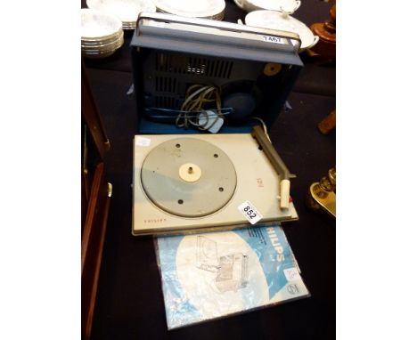 PORTABLE RECORD PLAYER. 1960s Phillips portable record player with instruction book