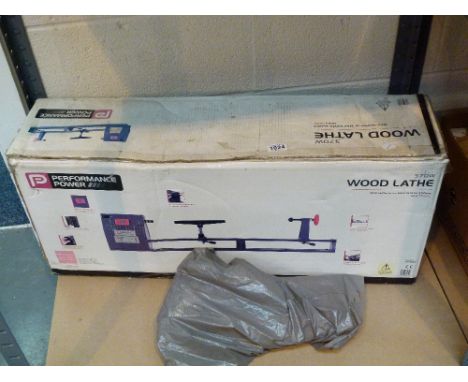 PERFORMANCE POWER WOODWORKERS LATHE. Performance Power wood workers lathe with tools