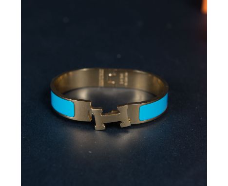 Bracelet in box. Metal chromed, blue enamel, close up in function , oval shape . 6,2x5,2 cm 