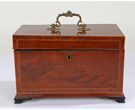 19th Century mahogany tea caddy, with a swing handle above a rectangular top enclosing three compartments on bracket feet, re