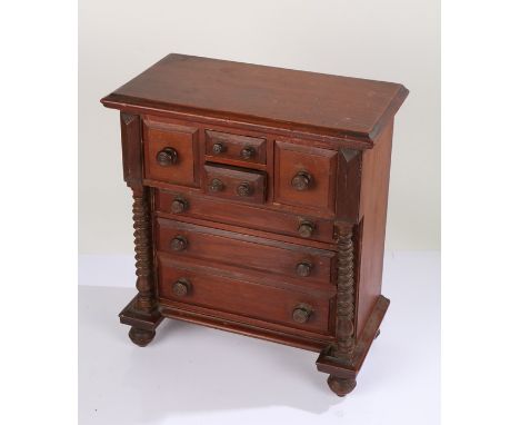 Victorian apprentice piece, in the form of a Scottish mahogany chest of drawers, fitted with two deep drawers either side of 