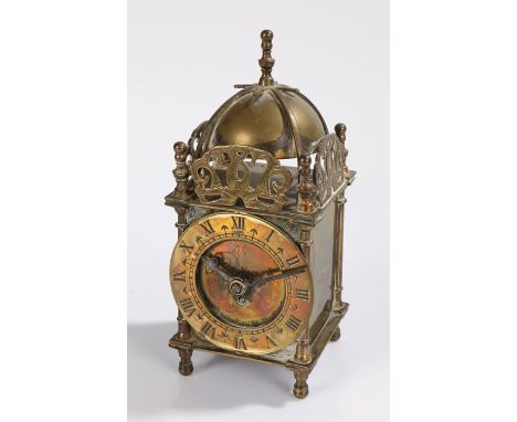 Smiths lantern clock, the brass case with bell to the pierced pediment, the dial with Roman numerals, 17.5cm high