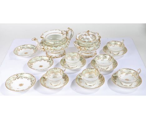 Victorian porcelain part tea service pattern, the white and green ground with gilt foliate decoration, consisting of teapot, 