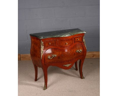 French walnut commode, 20th Century, of bombe form, the shaped green marble top above three small drawers flanked by gilt met
