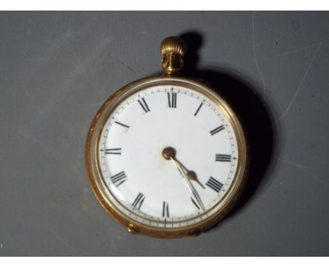 A lady's 18 carat gold pocket watch, the case with foliate and floral engraving, white enamel dial with Roman numerals, match
